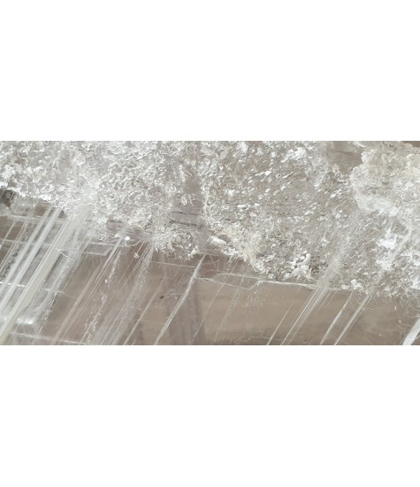 Selenite crystal with Leimonite