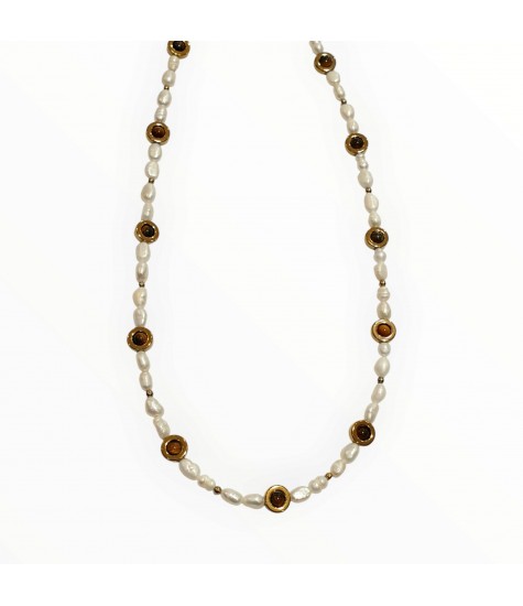 Μαργαριταρια, αιματιτες και Μάτι τίγρης.